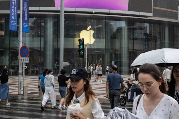 Outside an Apple store in Beijing. Apple and China have a complicated relationship, according to Patrick McGee.