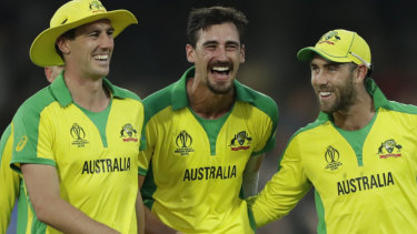 Australia's Mitchell Starc, centre, celebrates after Australia defeated New Zealand by 86 runs.