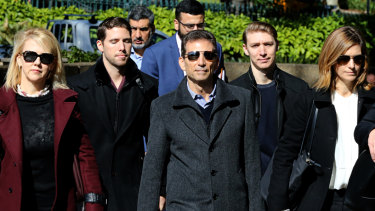 Serge Benhayon, centre, outside the Supreme Court during his defamation case against Esther Rockett.