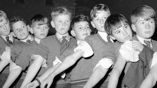 Pupils at Scotch College in Melbourne lining up for Salk vaccine injections for polio.