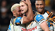 Api Koroisau celebrates with Adam Doueihi.