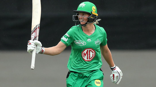 Meg Lanning of the Stars celebrates after scoring a half century during the Women's Big Bash League match between the Melbourne Renegades and the Melbourne Stars at Hurstville Oval in Sydney on Sunday.