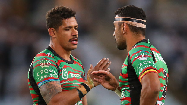 Dane Gagai and Alex Johnston celebrate with their signature handshake at full time.