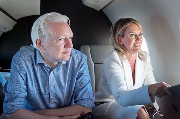 Robinson with Julian Assange after the Wikileaks founder secured his freedom. 