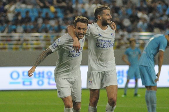 Suwon Samsung Bluewings pair Adam Taggart (left) and Terry Antonis will be part of the first match of the K League season, which will be broadcast in Australia on Optus Sport.