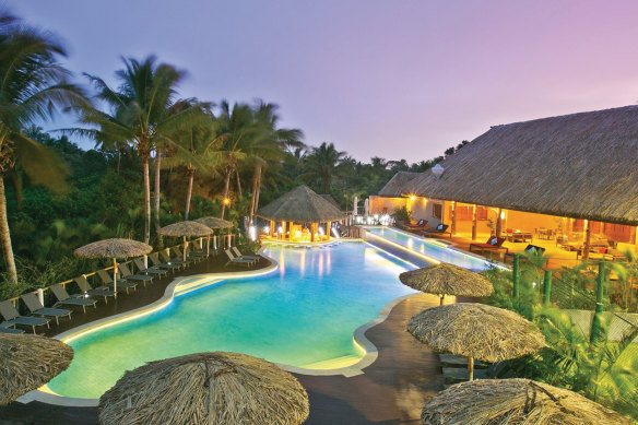 Kid-free … relax at Outrigger Fiji Beach Resort’s adult-only pool.