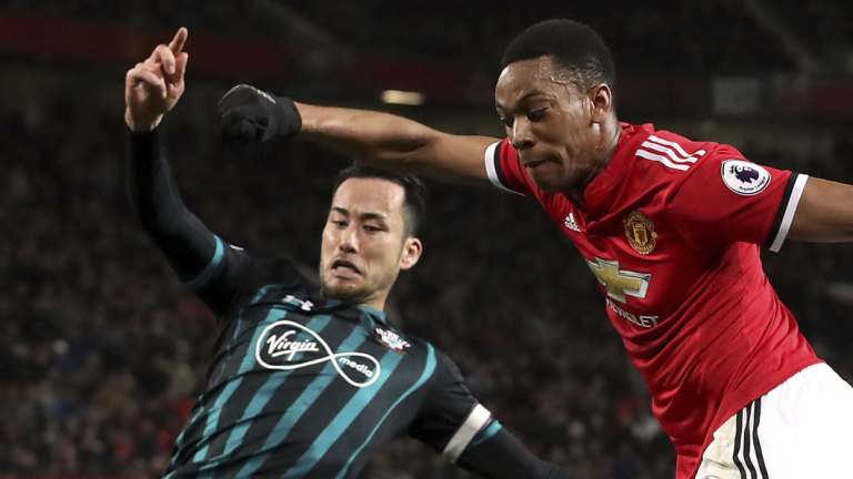 Maya Yoshida, left, is a key part of Japan's Asian Cup side.