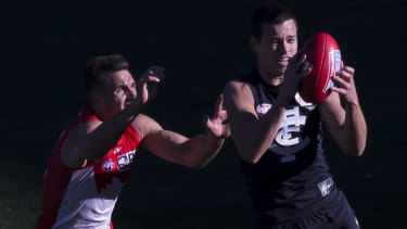 Out of the shadows: Jack Silvagni of the Blues takes a mark at a blustery SCG.