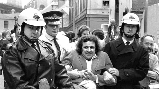 Jack Mundey being carried from a protest at The Rocks in the early seventies.