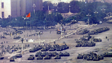 Troops and tanks gather in Beijing on June 5, 1989, one day after the military crackdown.