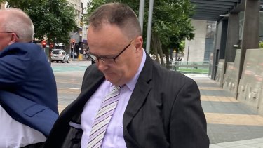Glen Richard Prentice leaves Brisbane Magistrates Court on Friday.