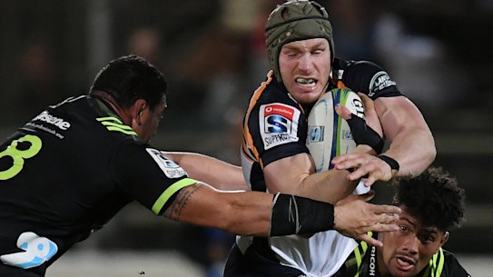 World class: David Pocock on the burst in the round-three match against the Hurricanes.