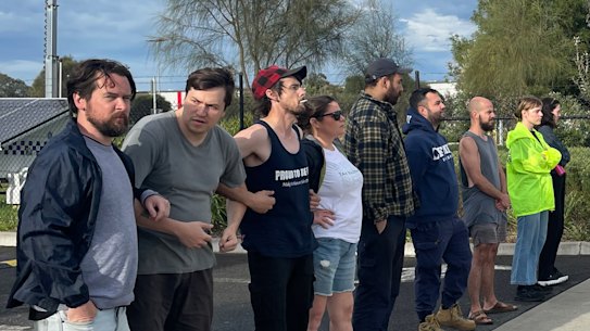 A human barricade at Dandenong South Woolworths Distribution centre.