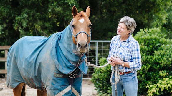 Karen Curnow with her horse, George.