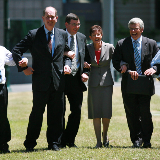 L-R: Tim Pallas, Richard Wynne, Daniel Andrews, Lisa Neville, Joe Helper and James Merlino link arms after joining the Labor frontbench in 2006.