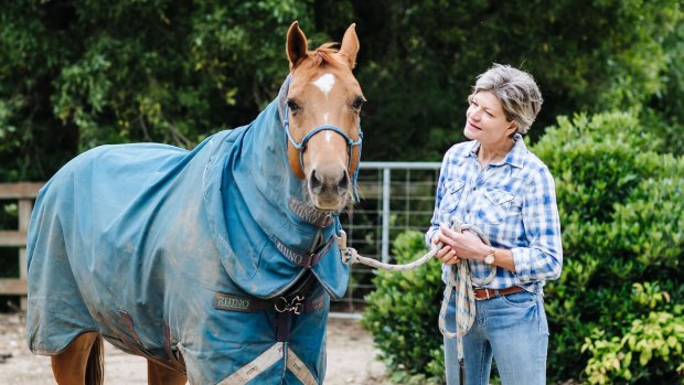 Karen Curnow with her horse, George.