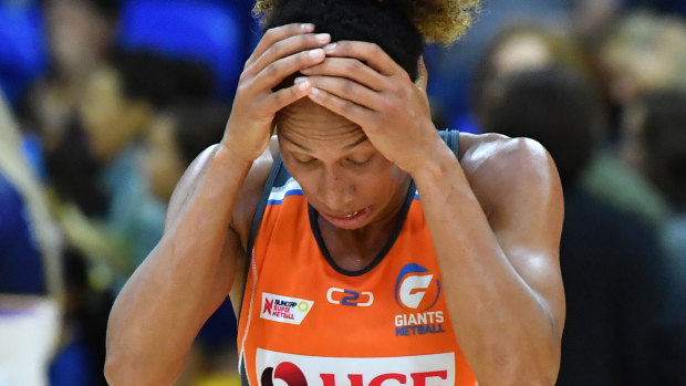 Heart-breaker: Giants' Serena Guthrie reacts after the final whistle as the Lightning snatch the draw.