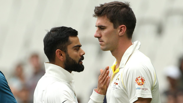 Management: Pat Cummins, seen here being consoled by Virat Kohli, needs to be monitored due to his immense value to the team.