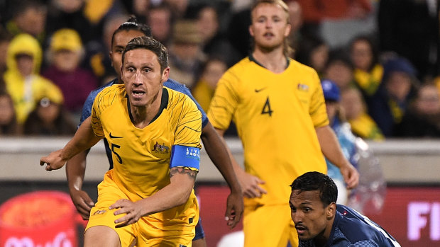 Game on: Mark Milligan has warned against complacency against Taiwan.