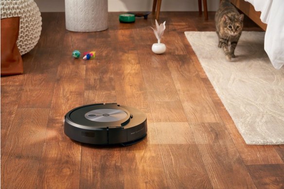 The Roomba Combo J7+ vacuums and mops, with its mop pad able to be stored on top of the unit when not needed.