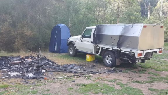 Russell Hill and Carol Clay died in the remote Wonnangatta Valley in 2020. Pictured are Hill’s Toyota LandCruiser and the burnt-out site at Bucks Camp.