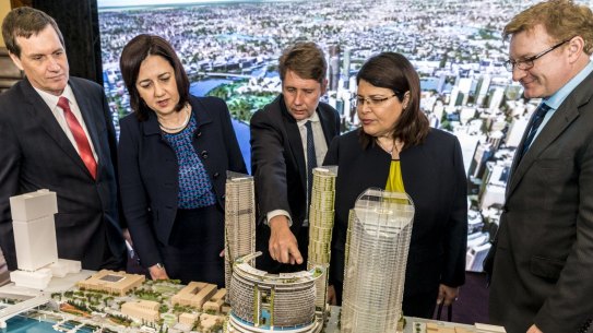 (From left) former MP Anthony Lynham, Premier Annastacia Palaszczuk, then-chief executive of Echo Entertainment (Star) Matthew Bekier, MP Grace Grace and Echo Entertainment Queensland director Geoff Hogg (now Star acting-chief executive) looking at a model of the Queen’s Wharf Brisbane development in 2015.