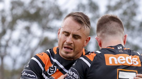 Josh Reynolds (left) warms up for the match against the Panthers on Saturday night.