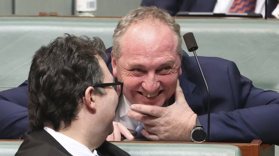 Barnaby Joyce chats to Nationals colleague George Christensen during question time earlier this year.