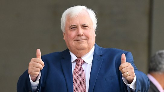 Businessman Clive Palmer gestures as he leaves the Supreme Court in Brisbane, Friday, October 26, 2018. Mr Palmer is trying to stop a second judge from hearing his legal battle with the liquidators of his collapsed Queensland Nickel business. (AAP Image/Dan Peled) NO ARCHIVING