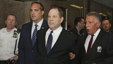 Harvey Weinstein is escorted in handcuffs to a courtroom in New York, on July 9, 2018. 