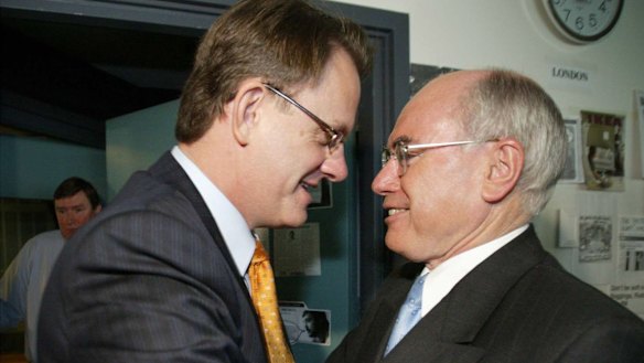 Mark Latham aggressively shook John Howard's hand after a radio interview during the 2004 campaign.
