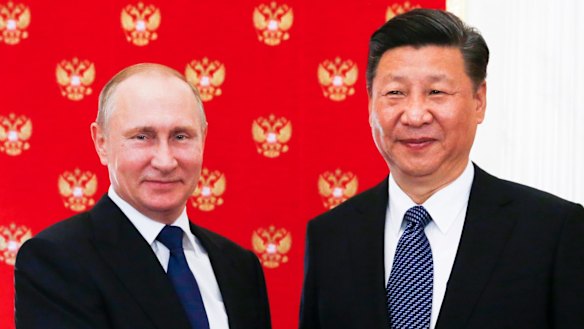 Russian President Vladimir Putin, left, and China's President Xi Jinping were both in Soros's sights.