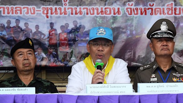 Narongsak Osottanakorn (centre) during a press conference in Mae Sai at the height of the rescue effort.