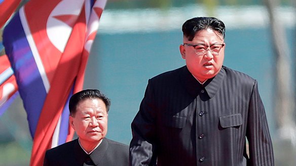 North Korean leader Kim Jong-un, right, and Choe Ryong Hae, vice-chairman of the central committee of the Workers' Party, arrive for the official opening of the Ryomyong residential area, in Pyongyang, North Korea.