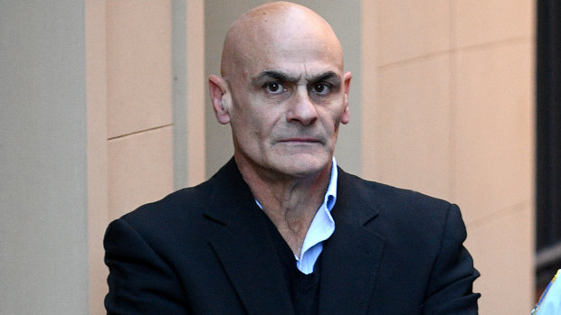 Vinzent Tarantino is led from court on Thursday.