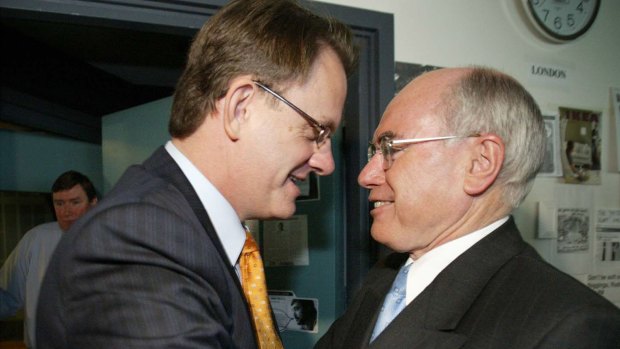 Mark Latham aggressively shook John Howard's hand after a radio interview during the 2004 campaign.