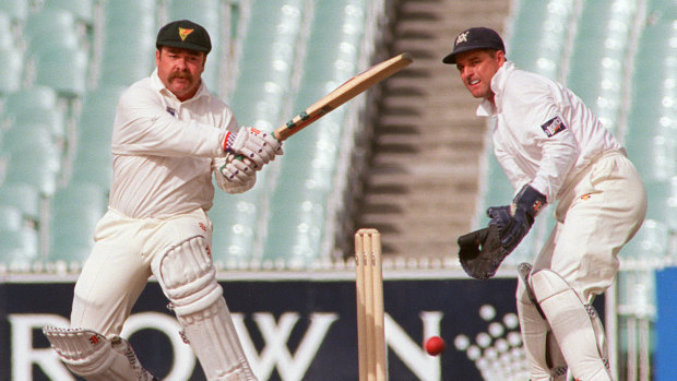 Darren Berry keeps to David Boon in a Shield match.
