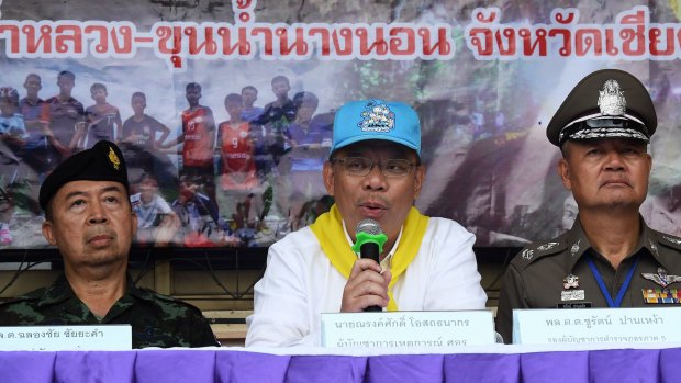 Narongsak Osottanakorn (centre) during a press conference in Mae Sai at the height of the rescue effort.
