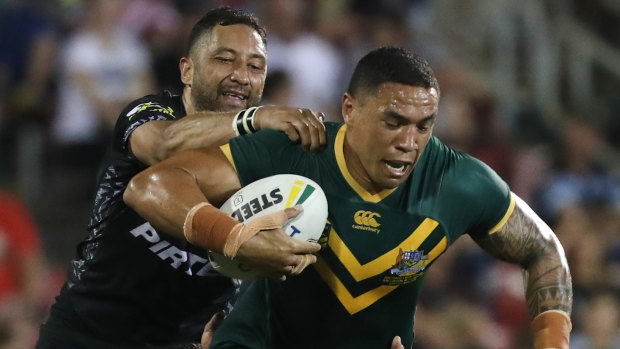 No divided loyalty: Tyson Frizell trucks it up against New Zealand.