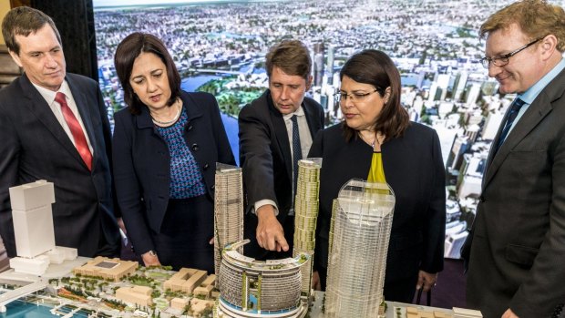 (From left) former MP Anthony Lynham, Premier Annastacia Palaszczuk, then-chief executive of Echo Entertainment (Star) Matthew Bekier, MP Grace Grace and Echo Entertainment Queensland director Geoff Hogg (now Star acting-chief executive) look at a model of the Queen’s Wharf Brisbane development in 2015.