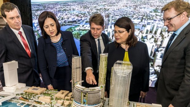 (From left) former MP Anthony Lynham, Premier Annastacia Palaszczuk, then-chief executive of Echo Entertainment (Star) Matthew Bekier, MP Grace Grace and former Echo Entertainment Queensland director Geoff Hogg look at a model of the Queen’s Wharf Brisbane development in 2015.