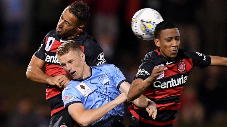 Out: Trent Buhagiar of Sydney competes for possession against the Wanderers in the FFA Cup semi-final.