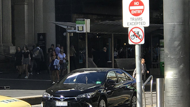 A P-plater accidentally drives on tram tracks in Bourke St Mall.