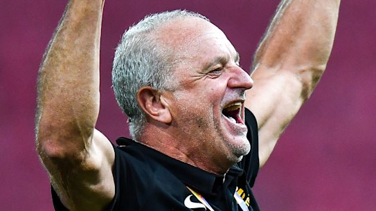Graham Arnold celebrates Australia's qualification for Tokyo 2020 after the Olyroos' win over Uzbekistan.