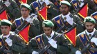 In this September 21, 2016, file photo, Iran’s Revolutionary Guard troops march in a military parade in Tehran, Iran. 