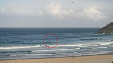Matthew Devine was in the water at Cabarita Beach on Sunday when he was knocked from his board and thrown into the water.