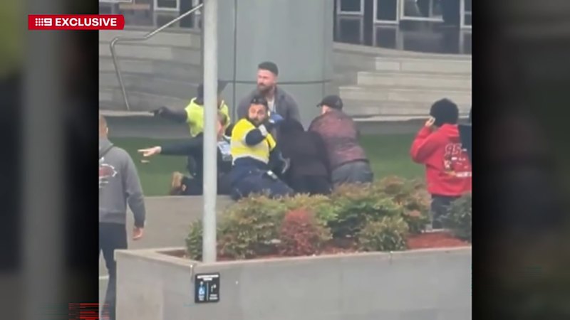 Man charged after mum stabbed, boy punched in random CBD attack