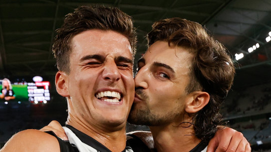 Brothers in arms Nick Daicos (left) and Josh Daicos show their love for each other last year, Nick’s first in the AFL.