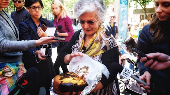 Pellegrini's employee Lucia holds Mr Malaspina's favourite cake.