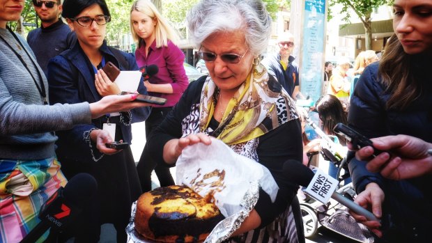 Pellegrini's employee Lucia holds Mr Malaspina's favourite cake.